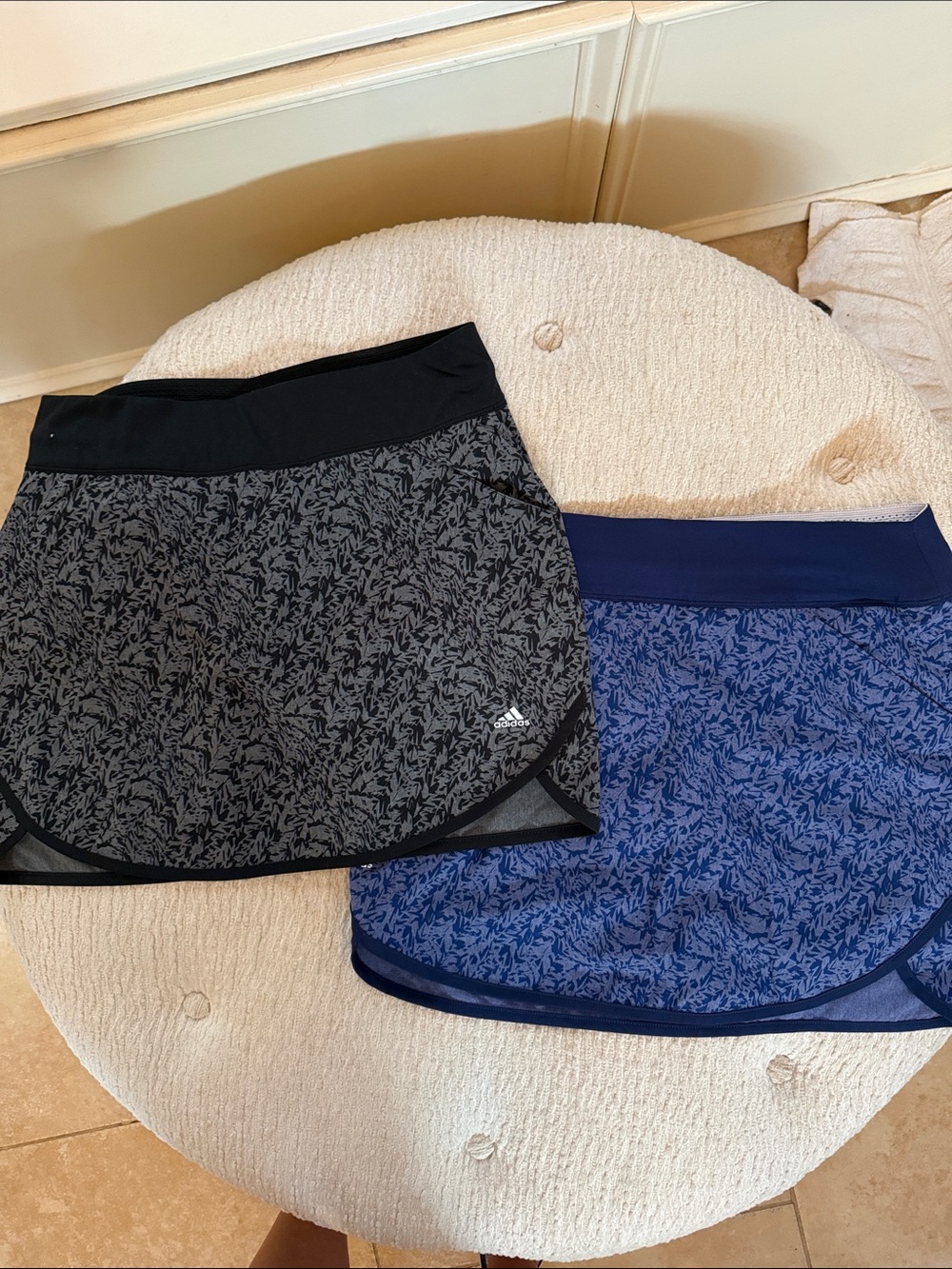 2 adidas Women's Printed golf  Skirts in Black and Blue